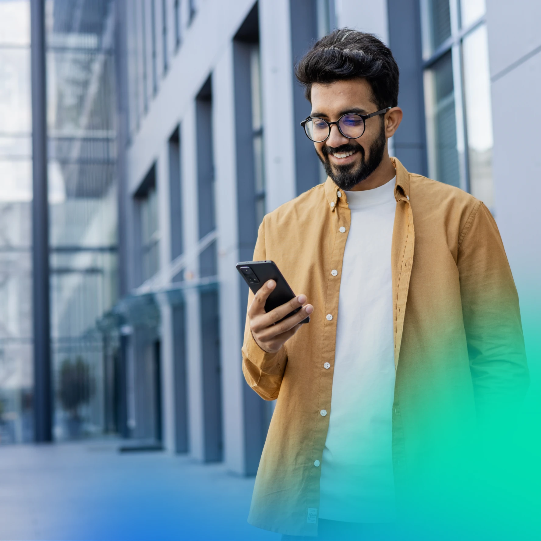 Man on his phone outside an office building
