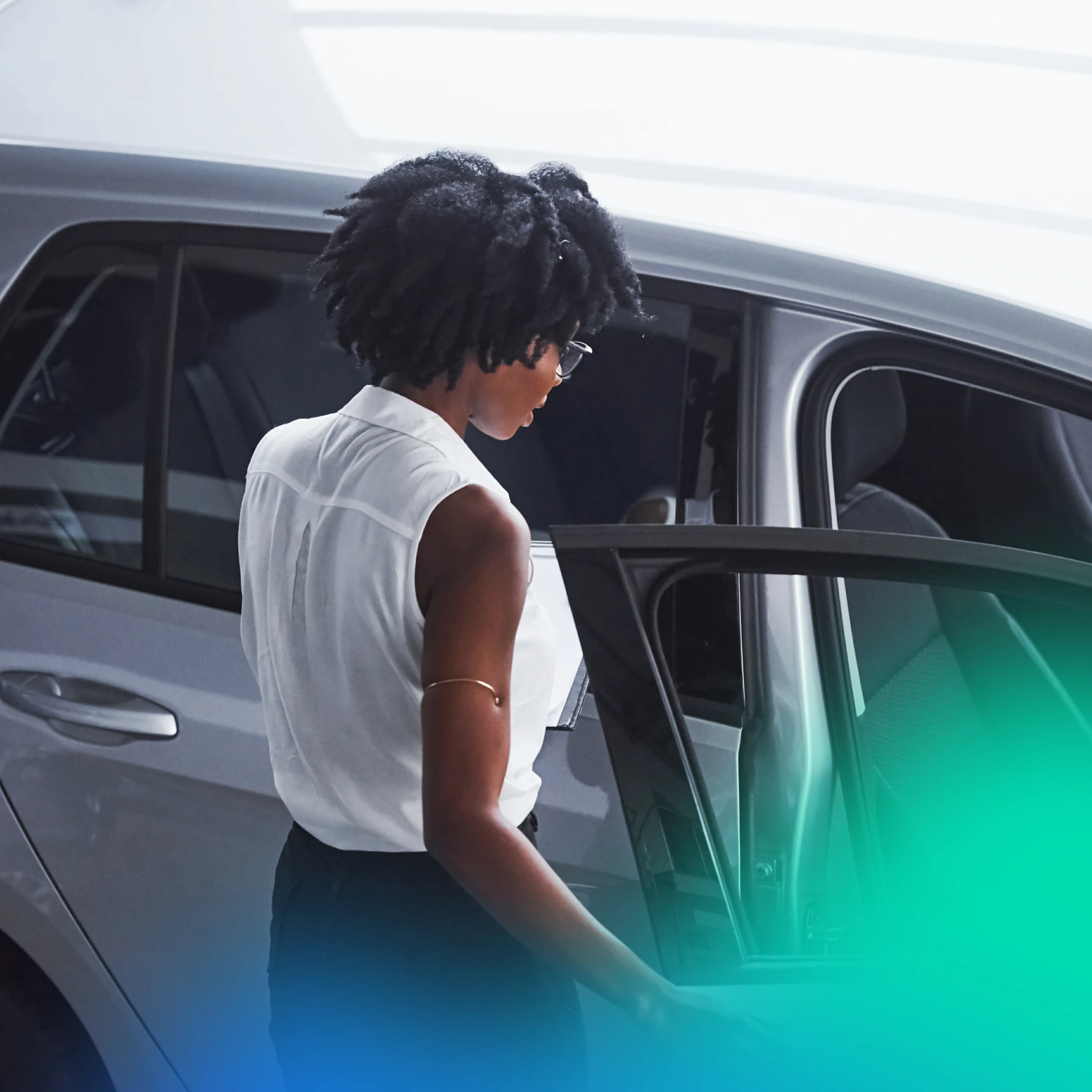 Woman getting into a car